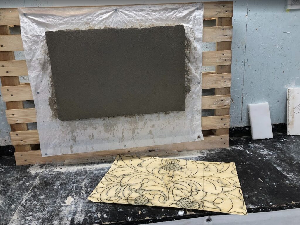 En pusset flate med en tegning som skal overføres til flaten.